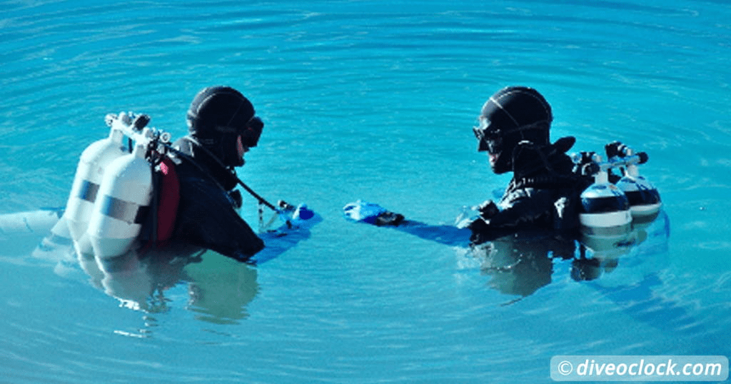 image of two divers talking to each other