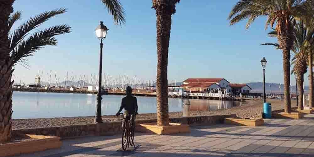A guy in a bicycle in Carrion Beach Spain