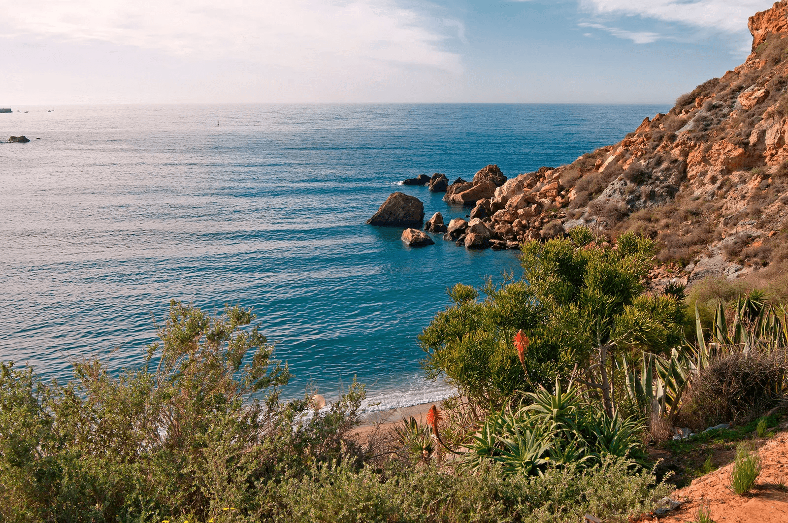 image from Cala Cortina taken from the cliffs