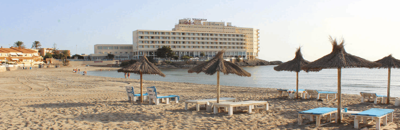 image from Playa de Galua showing the Galúa Hotel on the background