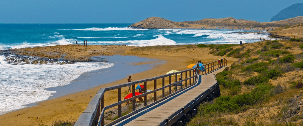 image showing multiple people enjoying the sun at Calblanque beach