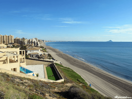 image showing the sea and the apartments next to the beach