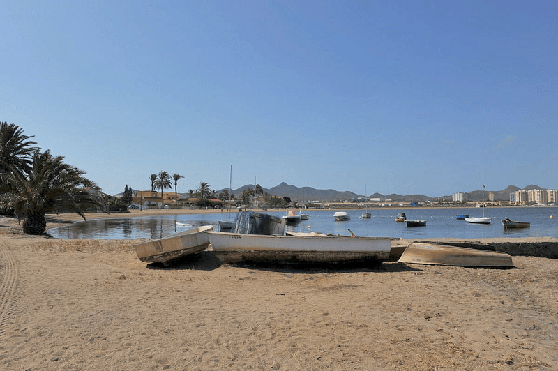 picture of multiple boats on the shore of playa del vivero