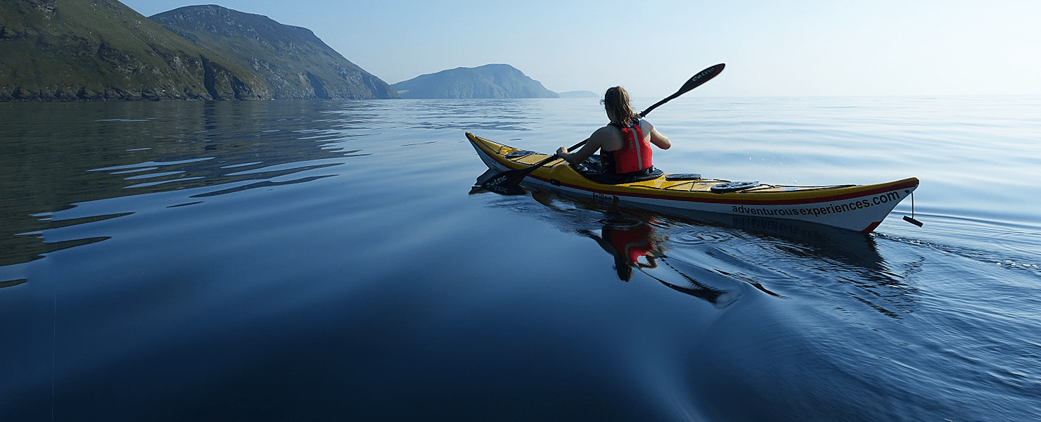 image of a person kayaking in the river