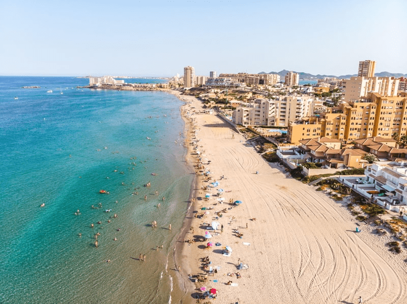 image of the beach in Cartagena showing the city on the background