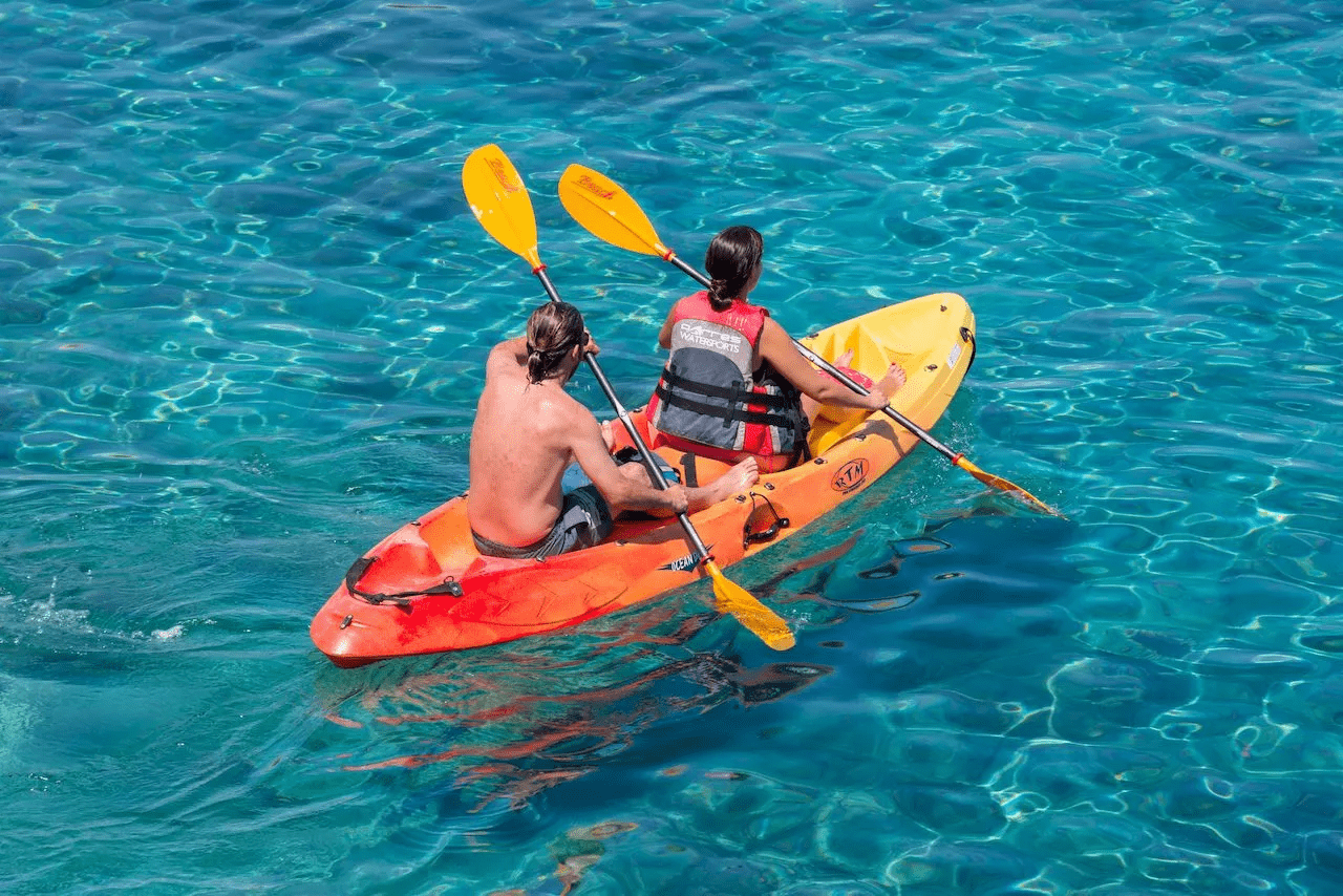 picture of two people inside a kayak