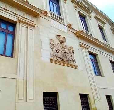 A section of the facade of the Almudí Palace