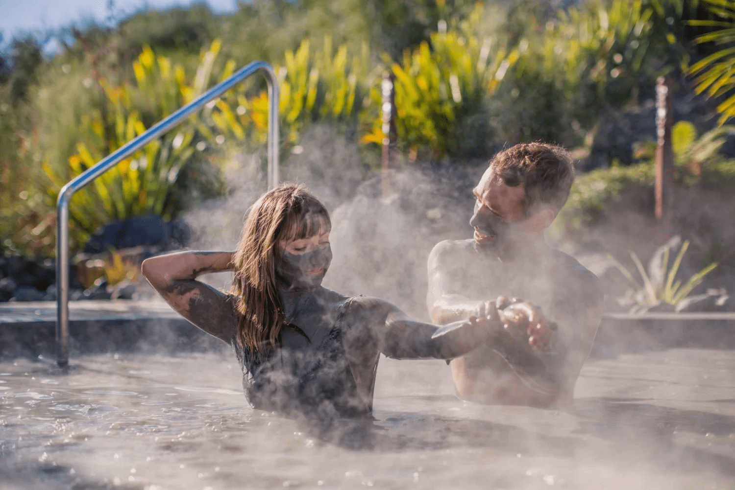 image of a couple doing mud bath at a spa