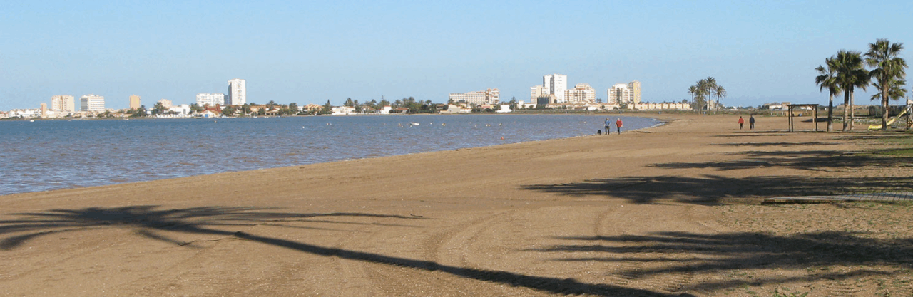 image of Playa Honda showing the shore with the city on the background